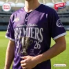 Front view of a purple Fremantle Dockers AFL 2026 Champions Baseball Jersey featuring Premier graphics and a trophy.