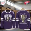 Front and back view of the Fremantle Dockers AFL 2026 Premiers hockey jersey hanging in a locker room setting.
