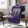 Front view of a purple hockey jersey on a locker room bench featuring Premiers 2026 text and a trophy graphic.