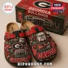 Georgia Bulldogs Sanford Stadium Suede Clogs featuring red, black, and white team graphics, bulldogs, and stadium imagery.