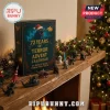 Godzilla 72 Years Of Terror Advent Calendar 2026 featuring a green monster in a Santa hat on a wooden fireplace mantle.