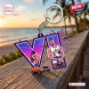 Front view of a Grand Theft Auto VI Custom Shape Acrylic Keychain featuring a Roman numeral VI design with character graphics.