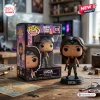 Lucia Funko Pop vinyl figure stands next to its branded display box on a wooden surface.