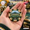 Hand holding a decorative poker chip featuring Lambeau Field and the number 25 in a Green Bay Packers deluxe poker set.