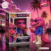 Front view of a pink alligator vinyl figure in a blue shirt holding a tropical drink next to its branded display box.
