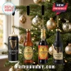 Guinness Advent Calendar 2026 featuring miniature beer bottle and can ornaments hanging on a Christmas tree.