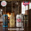 Guinness Advent Calendar 2026 hanging ornaments shaped like stout cans and bottles against a cozy fireplace background.