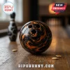 Halloween Bowling Ornament Advent Calendar 2026 featuring a marbled black and orange ball on a wooden surface.