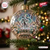 Front view of a Hatsune Miku 20th Anniversary Christmas Ornament hanging on a pine tree branch.