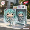 Front view of the Hatsune Miku 20th Anniversary Vinyl Figure with its box.