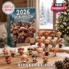Highland Cow Christmas Advent Calendar 2026 box with twenty-four miniature cow figurines on a snowy wooden table.