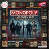 Horror Halloween 2026 Monopoly game board featuring iconic film slashers like Michael Myers and Pennywise on a dark background.