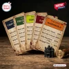 Horror Halloween 2026 Monopoly Game title deed cards with blood splatter accents on a dark wooden surface.
