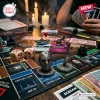 Horror Halloween 2026 Monopoly Game board featuring iconic metal horror film tokens, bloody dice, and macabre game money.