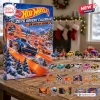 Front view of Hot Wheels 2026 Christmas Advent Calendar box with miniature toy cars displayed on a table.