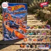 Front view of Hot Wheels 2026 Christmas Advent Calendar box with miniature toy cars displayed on wooden steps.