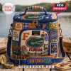 Igloo Florida Gators quilted lunch bag with blue and orange patches, Gator mascot embroidery, and a padded shoulder strap.