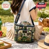Igloo Notre Dame Fighting Irish quilted lunch bag with school logos, mascot, and gold helmets on navy green fabric.