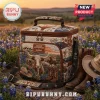 Igloo Texas Longhorns Quilted Lunch Bag featuring western art, longhorn cattle, and cowboy boots in a wildflower field.