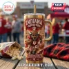 Indiana Hoosiers YETI Tumbler with Straw featuring a mascot graphic and school branding on a gold-tone metal insulated cup.