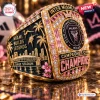 Close-up of Inter Miami CF 2024 Championship Commemorative Ring featuring Chase Stadium, palm trees, and pink accents.