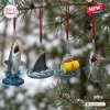 Jaws Advent Calendar 2026 hanging ornaments featuring great white sharks and film-inspired props on pine tree branches.