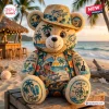 Front view of a Jimmy Buffett Plush Teddy Bear on a tropical beach setting wearing a hat and tropical shirt.
