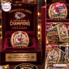 Close-up of a Kansas City Chiefs Championship Gold Commemorative Ring displayed inside a velvet-lined display box.