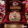 Front view of a gold championship ring inside a red velvet lined display box with Kansas City Chiefs team branding.