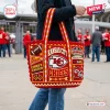 Kansas City Chiefs Crocheted Tote Bag featuring red and gold yarn, football graphics, and team logos held by a person.