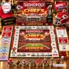 Top-down view of Kansas City Chiefs Monopoly board game displaying game board, themed currency, and miniature tokens.
