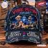 Front view of a distressed denim cap featuring Vibe Room 2027 tour graphics and two singers playing acoustic guitars.
