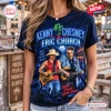 Front view of a person wearing a navy graphic tee featuring two guitarists and palm tree imagery.