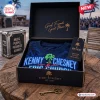 Folded blue Kenny Chesney x Eric Church Vibe Room 2027 Tour shirt inside a branded black gift box on a wooden table.