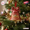 Levi’s Stadium 80th Anniversary Red Bell Ornament hanging on a Christmas tree with gold rim and festive snowflake details.