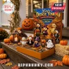 Little Doxie Town 2026 Halloween Spooky Advent Calendar featuring costumed duck figures on a porch with pumpkins and hay.