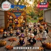 Little Doxie Town 2026 Halloween Spooky Advent Calendar box featuring twenty-four collectible duck figurines on wood floor.