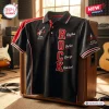 Front view of a men's rock electric guitar black polo shirt resting on a speaker.