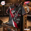 Front view of a Men's Rock The Night Electric Guitar Polo Shirt laid on a flight case in a music studio.