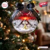 Metallica Master of Puppets 45th Anniversary glass ornament featuring miniature tombstones and hands on a black ribbon.
