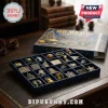 Michigan Wolverines 24-Day Christmas Advent Calendar featuring blue and gold team-themed miniature ornaments in a grid box.