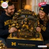 Michigan Wolverines Football Decorative Wreath with team mascot, stadium backdrop, and LED lights in maize and blue colors.