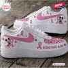 Side view of Mickey Mouse Breast Cancer Awareness Air Force 1 Sneakers featuring pink ribbons and paw prints.