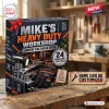 Front view of Mike's Heavy Duty Workshop Advent Calendar 2026 box on a wooden workbench with tools.