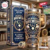 Front view of Milwaukee Brewers 2026 Champions Stanley Tumbler featuring ornate gold detailing and blue accents.