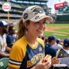 Close-up of a person wearing a cream Milwaukee Brewers 2026 NL Central Champions distressed cap at a baseball stadium.