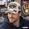 Front view of a man wearing a Milwaukee Brewers 2026 NL Central Champions distressed cap with graphic baseball patches.