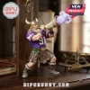 Minnesota Vikings Viktor The Viking Christmas ornament wearing a purple jersey and kilt while blowing a signal horn.