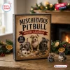 Front view of the Mischievous Pitbull Puppy Advent Calendar box with puppy ornaments on wooden table.
