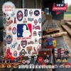MLB Team Mascot Collectible Advent Calendar box with league logos, surrounded by baseball figures and sports memorabilia.